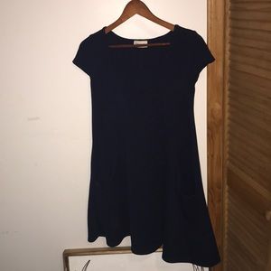 Tee-shirt dress with pockets. Very comfortable.